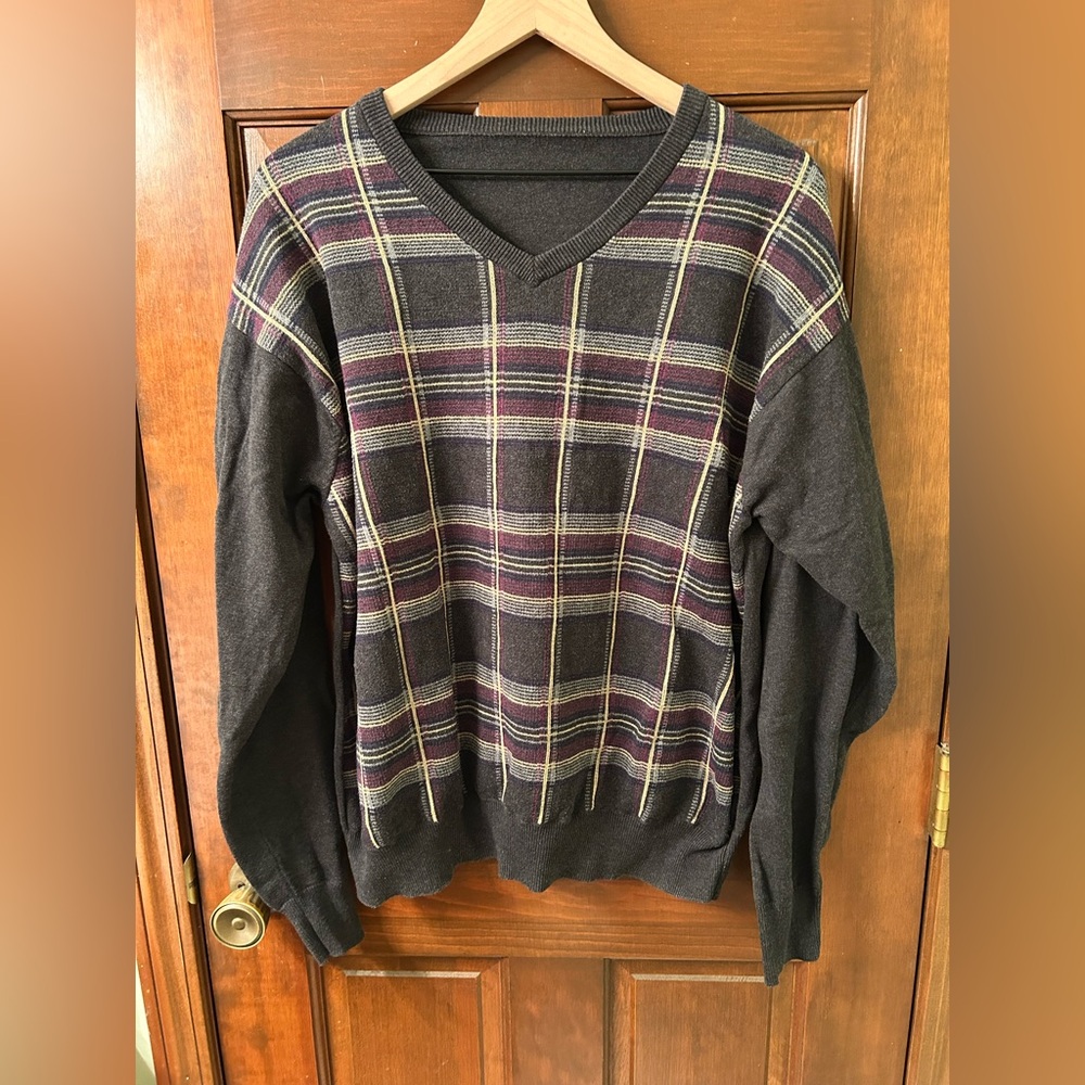 Nice V neck plaid banded bottom sweater. No brand or size tags.